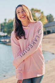 Lakegirl crossover french terry hoodie in soft almond blossom pink. A great summer-weight hoodie perfect for evenings at the lake.