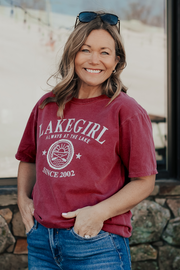 girl in a cranberry tshirt with puff ink lakegirl design