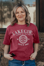 girl in a cranberry tshirt with a puff ink lakegirl design