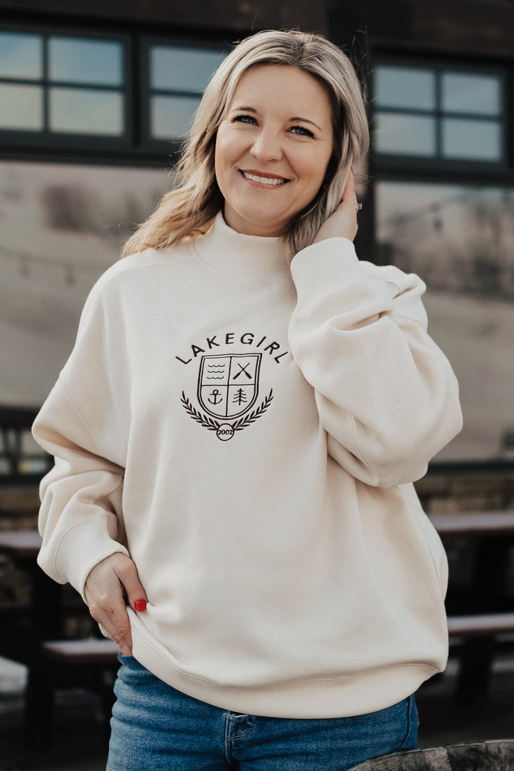 Ivory mock neck with embroidered lakegirl design